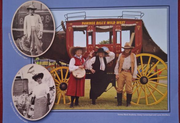 Lynn Atterbery, right, greets visitors in front of the Pawnee Bill Original Wild West Show stagecoach in this photo used for the show's calendar. He is a long-time show cast member. Photos from Oklahoma Historical Society.