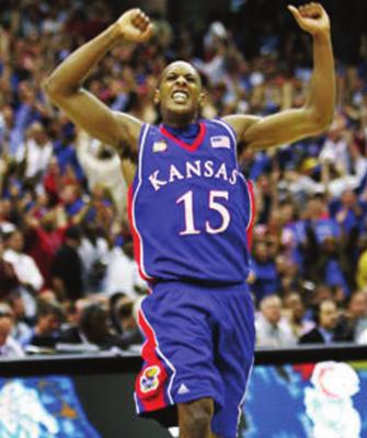 MARIO CHALMERS celebrates his buzzer beater that sent the 2008 championship game into overtime. Chalmers and the KU Jayhawks eventually defeated Memphis to win the title.