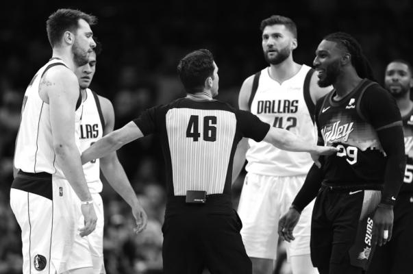The Dallas Mavericks’ Luka Doncic, left, and The Phoenix Suns’ Jae Crowder (99) are separated by referee Ben Taylor (46) during the first half of Game 2 of the Western Conference second-round playoff series at Footprint Center on Wednesday, May 4, 2022, in Phoenix, Arizona. (Christian Petersen/ Getty Images/TNS)
