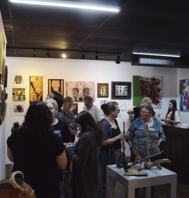 THE FINAL artists mixer was held at the Sacket Gallery on Friday, June 14. The space had served as a place for local artists to feature their works. (Photo by Calley Lamar)